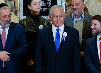 Likud, Religious Zionist parties sign coalition agreement, paving the way to a new government Likud leader Benjamin Netanyahu with Shas leader Aryeh Deri, Religious Zionist Party head Bezalel Smotrich and other party leaders at a swearing-in ceremony of the 25th Knesset in Jerusalem, Nov. 15, 2022. Photo: Olivier Fitoussi/Flash90