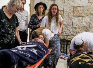Thousands attend funeral of Israeli sisters killed in Jordan Valley terror attack Mourners attend the funeral of terror victims Maia and Rina Dee on April 9, 2023. Photo by Noam Revkin Fenton/Flash90.