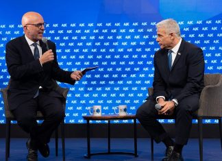 AJC Global Forum meets to tackle challenges facing the Jewish people American Jewish Committee CEO Ted Deutch (left) in conversation with opposition leader Yair Lapid at the AJC Global Forum in Tel Aviv, June 11, 2023. Photo by Yair Meyuhas/AJC.