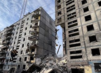 The price of American leadership Damage to a residential building in Zaporizhzhia, Ukraine, following a Russian airstrike on Oct. 9, 2022. Credit: National Police of Ukraine via Wikimedia Commons.