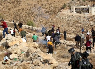 EU threatens to sue as Israel demolishes illegal PA school Palestinians clash with Israeli security forces as a bulldozer demolishes a Palestinian house in Hebron, Oct. 25, 2022. Photo by Wisam Hashlamoun/Flash90.
