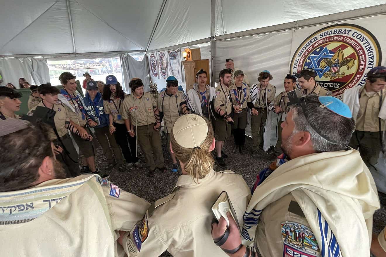 Singing “Siman Tov, Mazel Tov” after the bar mitzvahs of three fellow Jewish Scouts in the Synagogue Tent at the 2023 National Jamboree in Glen Jean, W.V., on July 24, 2023. Photo by the National Boy Scouts of America (BSA).