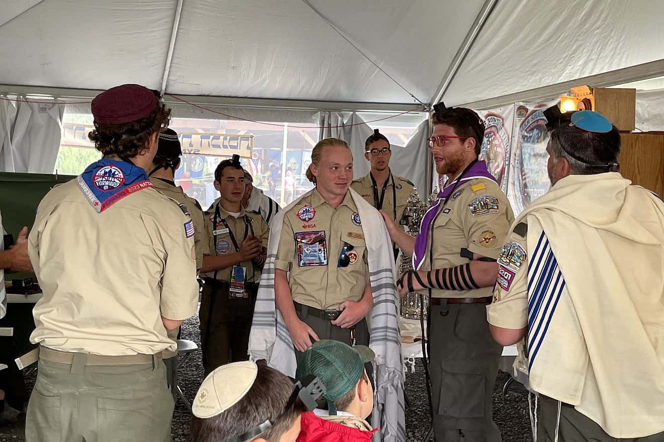 Jewish Scout Coulton Perrmann, 15, is called to the Torah at the 2023 National Scout Jamboree in Glen Jean, W.V., on July 24, 2023. Photo by the National Boy Scouts of America (BSA).