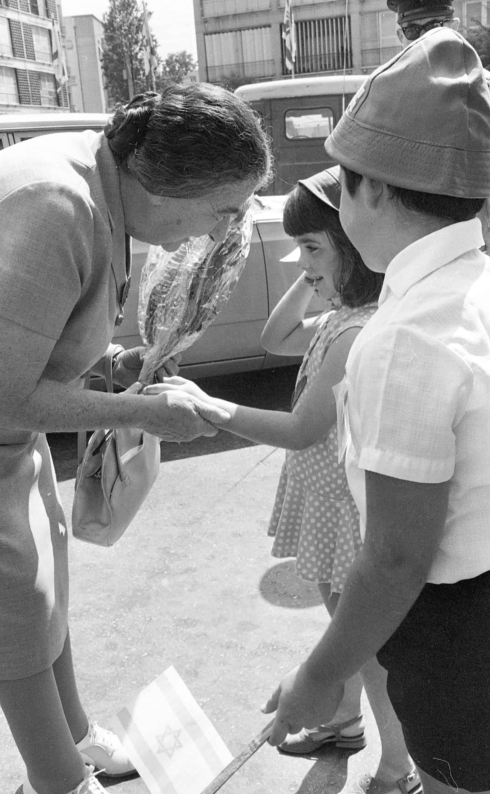 Israeli Prime Minister Golda Meir talks to children in Tel Aviv while visiting Tel Aviv City Hall on July 30, 1969. Credit: Israel Press and Photo Agency, Dan Hadani Collection/National Library of Israel via Wikimedia Commons.