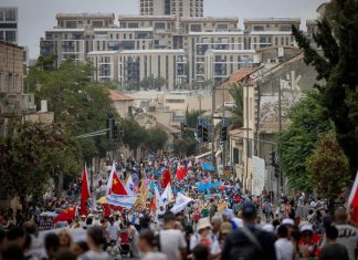 Thousands of evangelicals join Jerusalem March Thousands of Christians march through central Jerusalem to mark the Feast of Tabernacles on Oct. 4, 2023. Photo by Chaim Goldberg/Flash90.