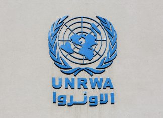 UNRWA teachers Telegram channel glorifies Oct. 7 Hamas massacre A sign on the United Nations Relief and Works Agency building in Rafah, the southern Gaza Strip, Nov. 29, 2021. Photo by Abed Rahim Khatib/Flash90.