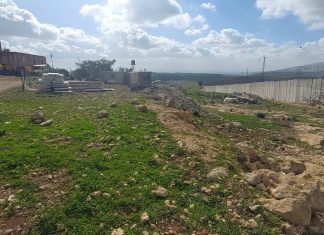 ‘Surge in illegal Arab building along Green Line a security threat’ Illegal Arab construction at the security barrier near Al-Ramadin in Judea. Photo: Courtesy.