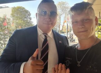 Australian senator says he didn’t know he was posing with neo-Nazi