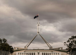 Four arrested after terror supporters occupy roof of Australian parliament