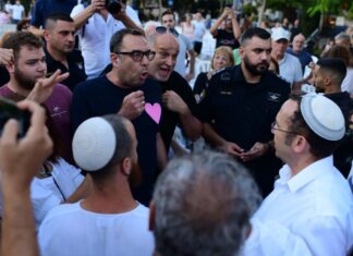 Supreme Court overturns Tel Aviv ban on outdoor Yom Kippur prayers Radical secular protesters clash with religious Jews in Tel Aviv on Yom Kippur, Sept. 24, 2023. Photo by Tomer Neuberg/Flash90.