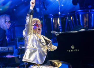 Tradition or tragedy? Musician Elton John performs "Rocket Man" during his Glastonbury Festival show, June 25, 2023. Credit: Raph_PH via Wikimedia Commons.