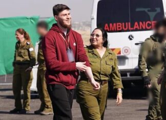 Top Russian rabbi helps freed Gaza captive put on tefillin Alexandre Troufanov enters into the hands of Israeli forces, inside the Gaza Strip, Feb. 15, 2025. Credit: IDF Spokesperson's Unit.