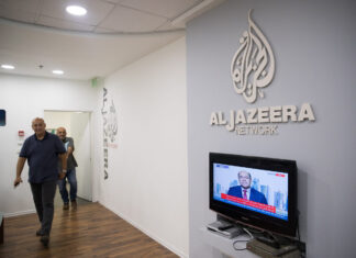 Oct. 7 survivors sue Al Jazeera for ‘serving as Hamas agents’ Workers at the now shuttered “Al Jazeera” offices in Jerusalem, on June 13, 2017. Photo by Yonatan Sindel/Flash90.