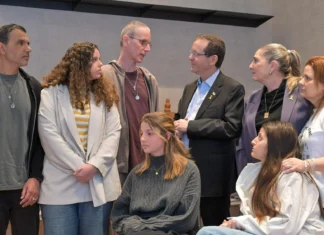 Israel’s first lady demands accountability for Hamas sex crimes Israeli President Isaac Herzog and first lady Michal Herzog meet redeemed hostage Ohad Ben Ami (third from left) on the 500th day since Oct. 7, Feb. 17, 2025. Photo by Kobi Gideon/GPO.