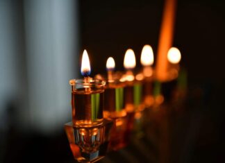In age of AI images, actors, politicians issue unusual Passover messages A Chanukah menorah in Jerusalem, Dec. 14, 2020. Photo by Mendy Hechtman/Flash90.