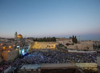 Jerusalem Day and the lie of ‘East Jerusalem’ Thousands of Jewish wave the Israeli flags as they celebrate Jerusalem Day, marking the 50th anniversary of the reunification of the city in June 1967, on their way to the Western Wall, May 24, 2017. Photo by Maor Kinsbursky/Flash90.