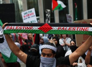 The Islamist capture of New York Pro-Palestinian, anti-Israel activists protest the war in Gaza on the second anniversary of the Hamas-led terrorist attacks in southern Israel on Oct. 7, at the Newscorp headquarters in New York City on Oct. 7, 2025. Photo by Michael M. Santiago/Getty Images.