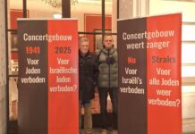 Christians protest Amsterdam venue’s Chanukah boycott Pieter van Oordt (left) and his brother Roger van Oordt protest the Royal Concert Hall of Amsterdam's decision to ban a Chanukah concert, Nov. 5, 2025. Credit: Courtesy of Christians for Israel.