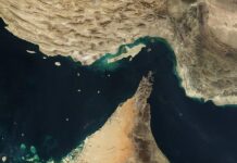 Tehran reverses decision to open Hormuz as ships come under fire